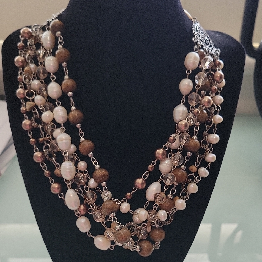 Mialisia Necklace 18" Strands of Glass, Wood, Crystal, Pearl and Metal Beads.